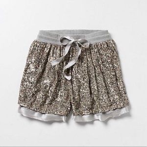 Sequin Dolan tie front shorts